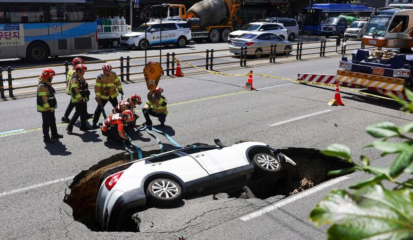 Sinkhole in South Korea Swallows an SUV Leaving Two People Injured